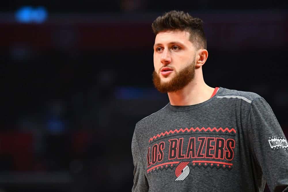 According to a report, the courtside fan who had his phone tossed by Jusuf Nurkic was talking smack about the big man's mom and recently deceased grandma