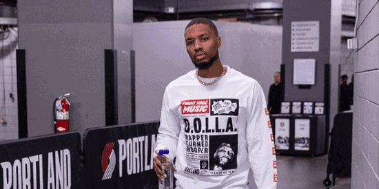 The Philadelphia 76ers hired Damian Lillard's longtime trainer as a coaching consultant on Wednesday and fans are losing their minds